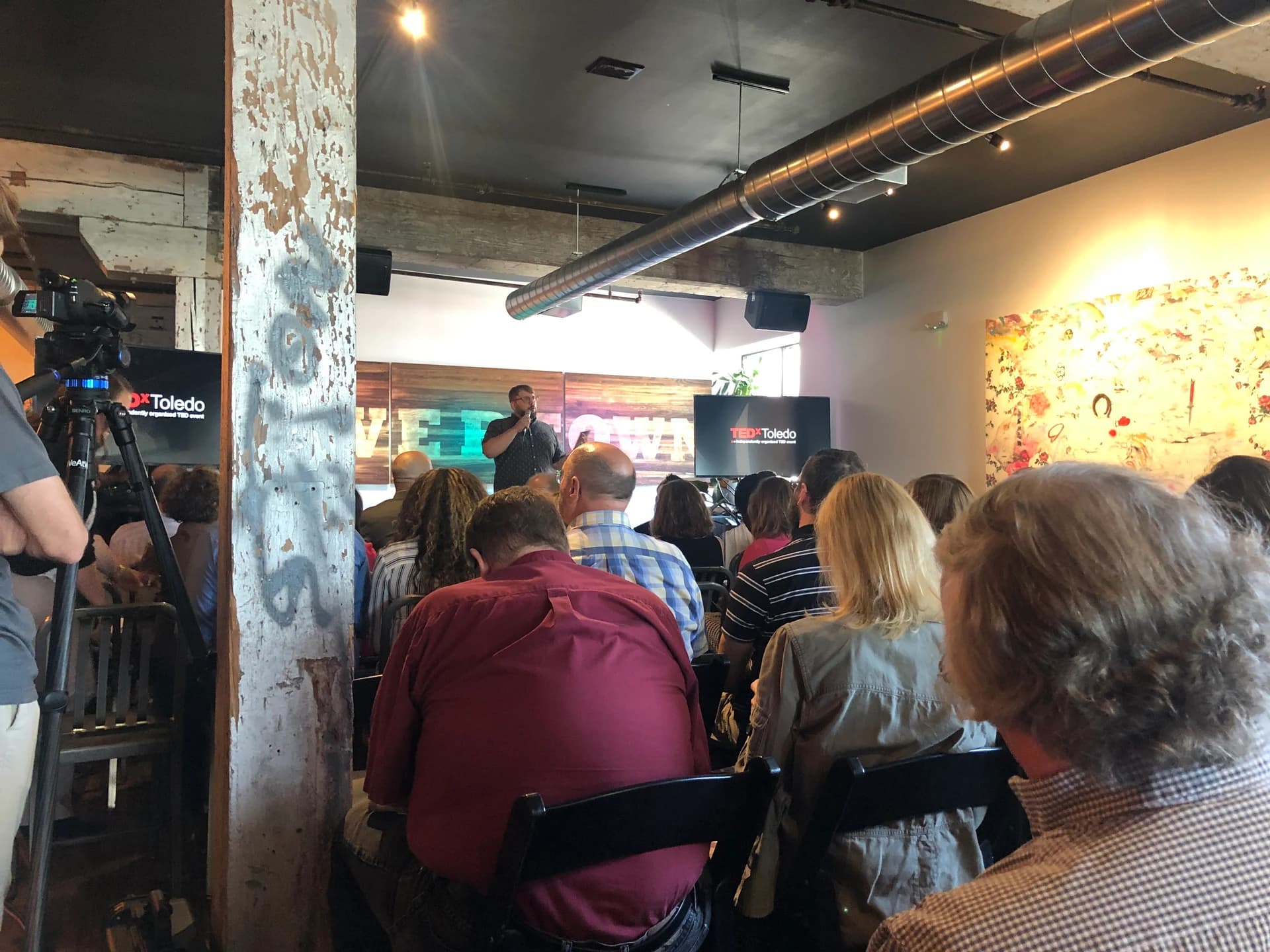 A room full of TEDxToledo attendees listening to a speaker in 2019